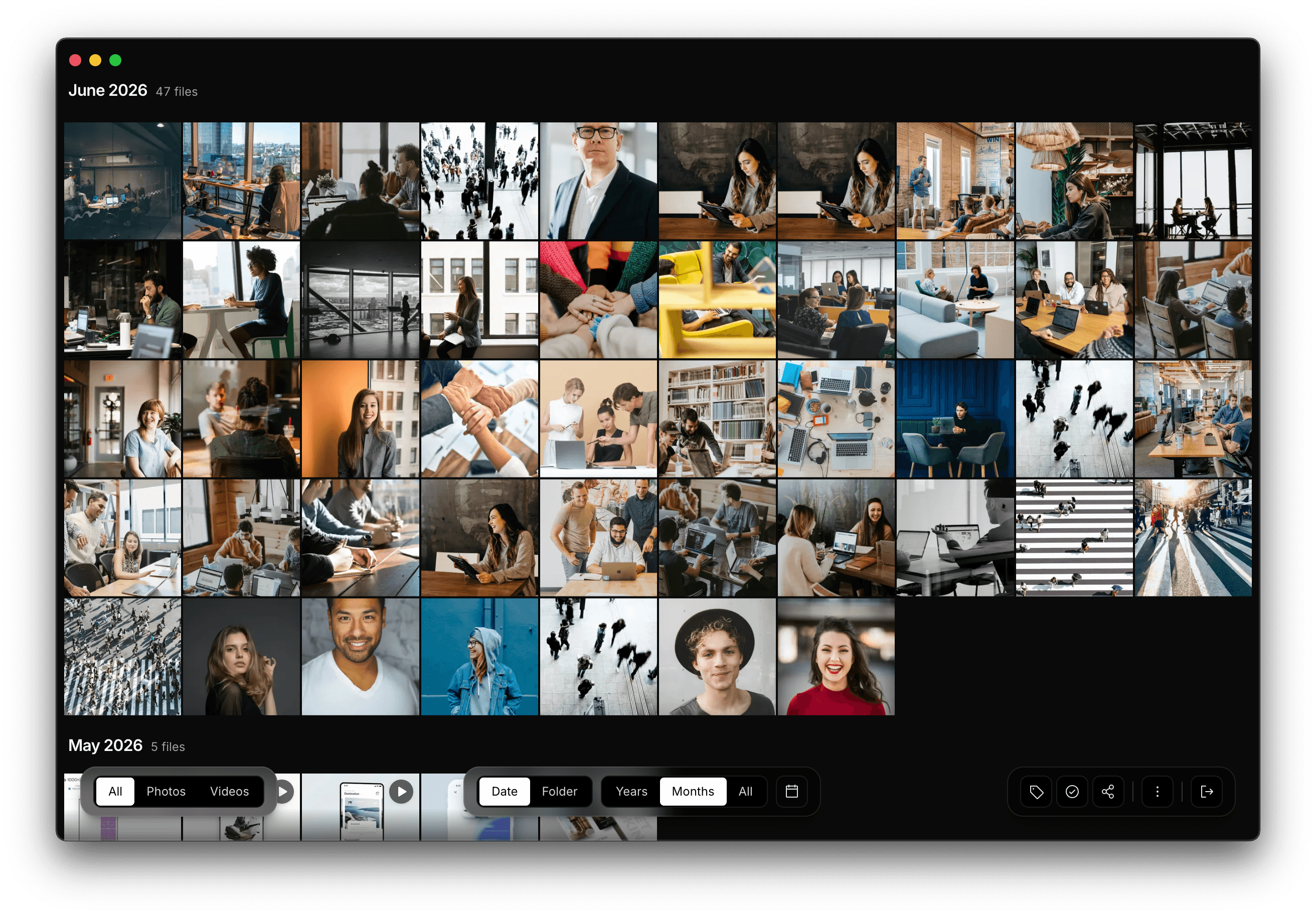 PhotoView timeline grid showing photos grouped by month